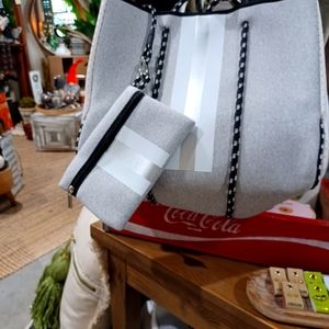 Women hand made tote new . light. For any occasion. Grey, silver, black , and wh